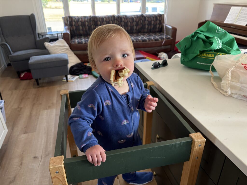 baby eating pancakes