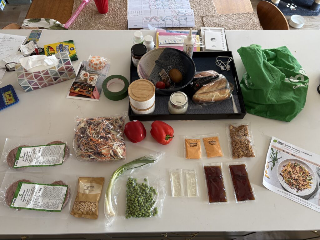 HelloFresh Smart Beyond Meat Crunch Salad ingredients ready on the counter (mess and all, because real life parenting).